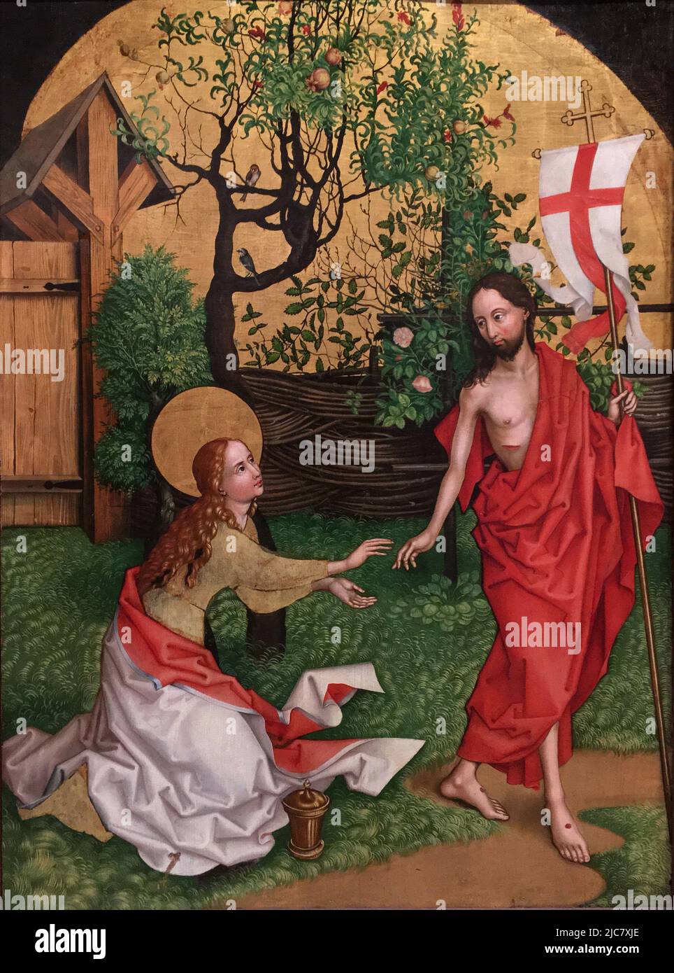 Noli me tangere von Martin Schongauer (1450–1491). Dieses Gemälde zeigt den Moment, in dem Maria Magdelene den auferstandenen Jesus wiedererkennt. Sie greift nach ihm, aber er bittet sie, ihn nicht zu berühren (Noli me tangere), da er noch nicht in den Himmel aufgestiegen ist. Stockfoto