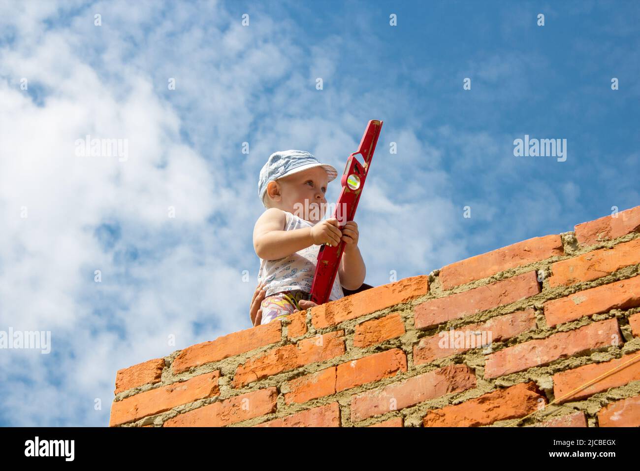 Berufsberatung Konzept - Junge auf der Baustelle Stockfoto