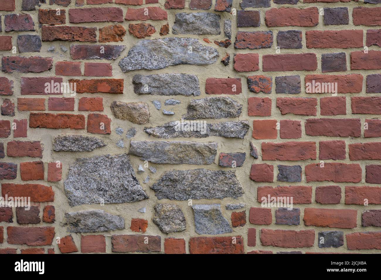 Hintergrund der alten alten Backstein- und Steinmauer Stockfoto
