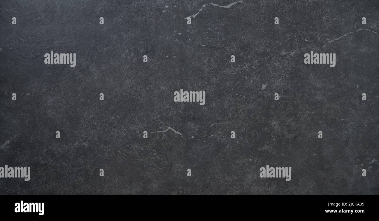 Hintergrund aus schwarzem Stein. Draufsicht. Freier Speicherplatz. Stockfoto
