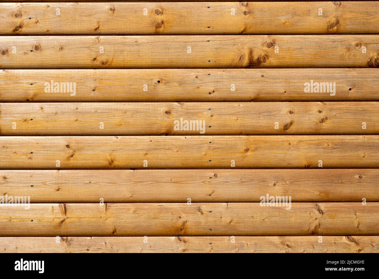 Hintergrund einer Wand aus bemalten Holzbohlen Stockfoto