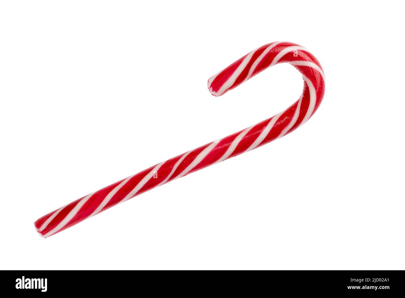 Minze gestreifter harter Zuckerrohr in traditionellen Weihnachtsfarben isoliert auf weißem Hintergrund. Nahaufnahme. Süßer Lutscher. Ein rotes Karamell für das neue Jahr Stockfoto