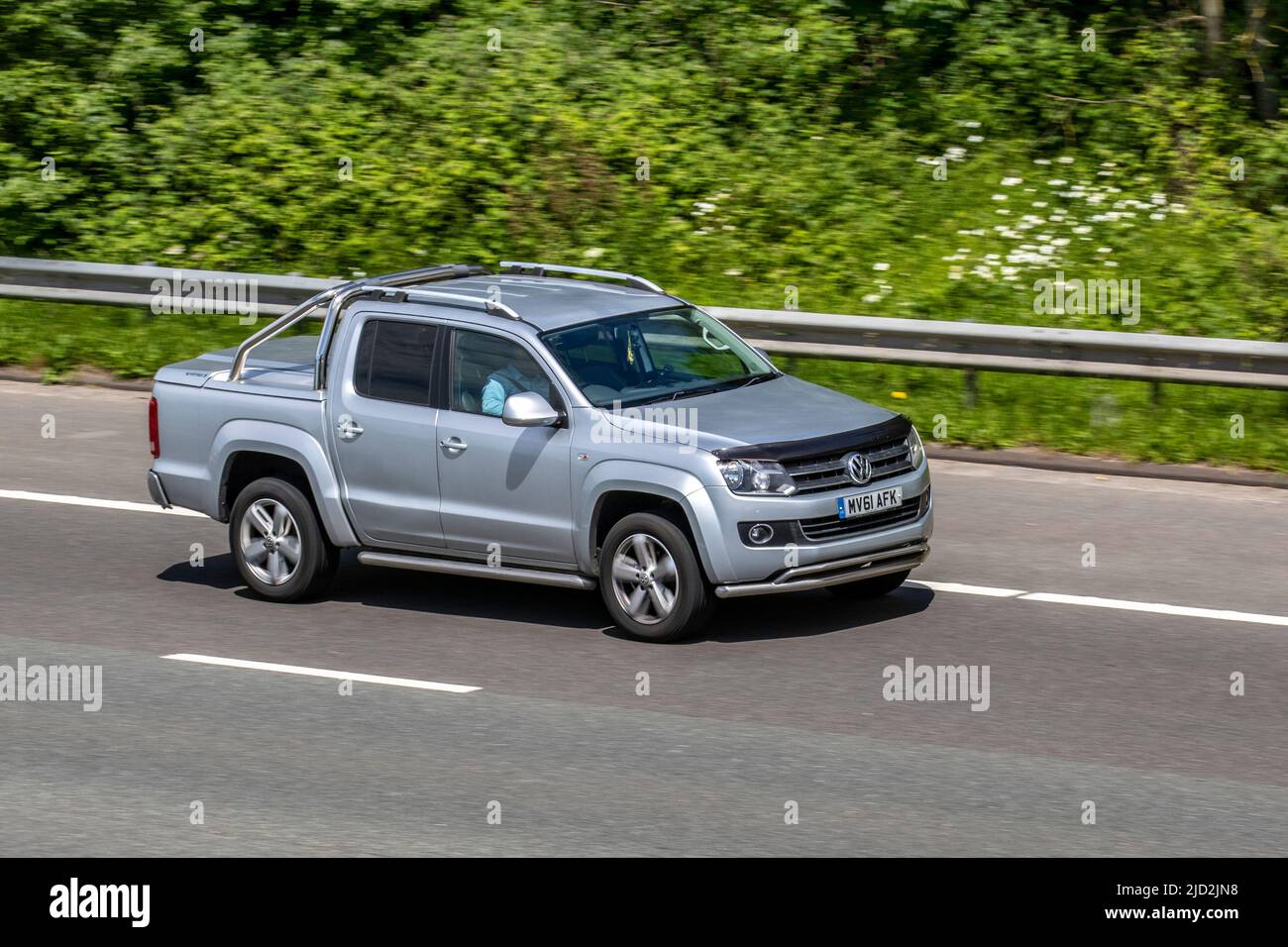 2011 VW Volkswagen Amarok TDI Highline 4Motion 1968cc Dieselaufnahme; Fahrt auf der M6 Motorway, Manchester, Großbritannien Stockfoto