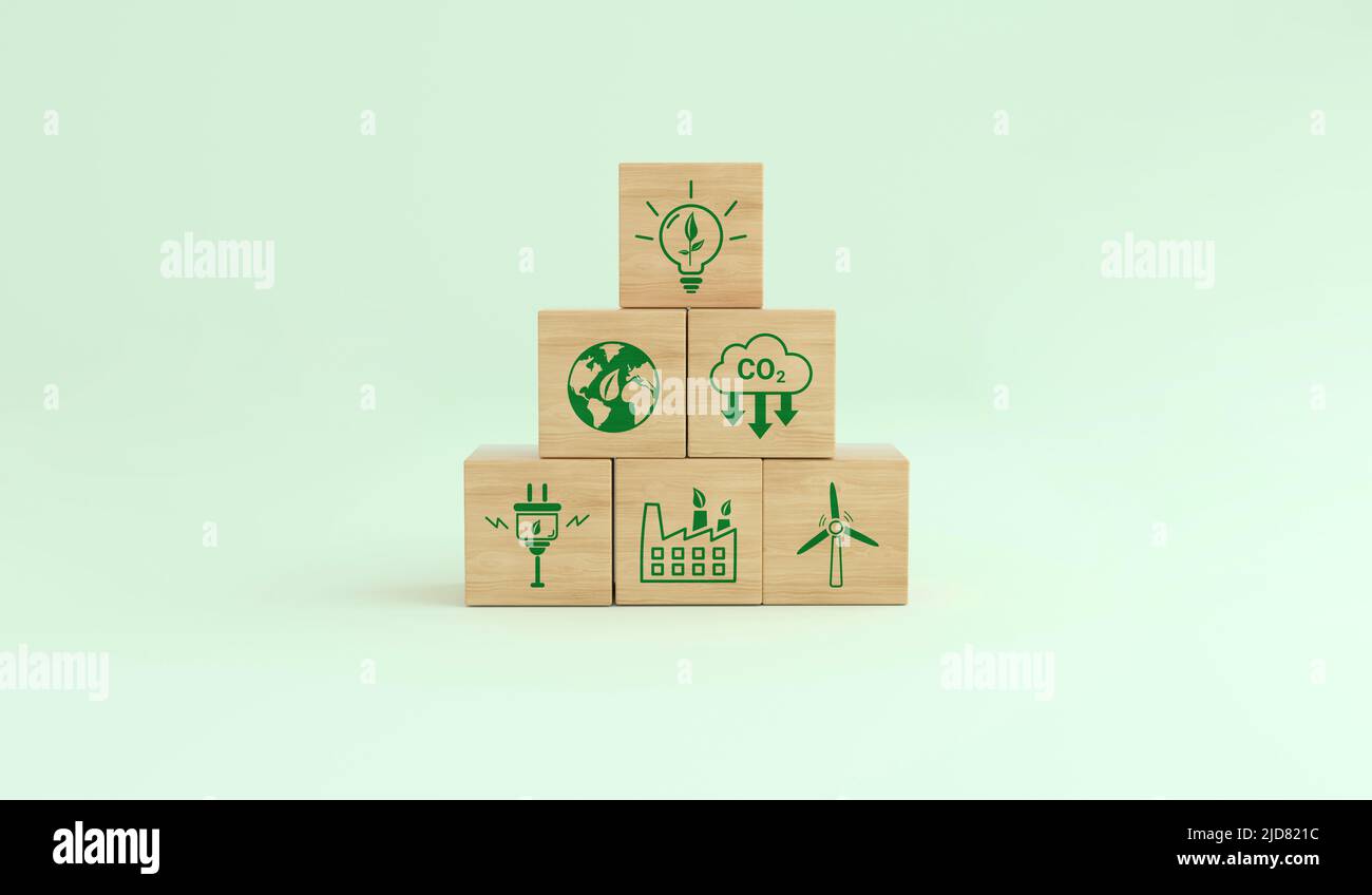 Alternative Energien, um den Planeten zu retten. Ökologische Symbole für den CO2-Fußabdruck auf einem Holzwürfel. Konzept der niedrigen CO2-Emissionen. 3D Rendern. Stockfoto