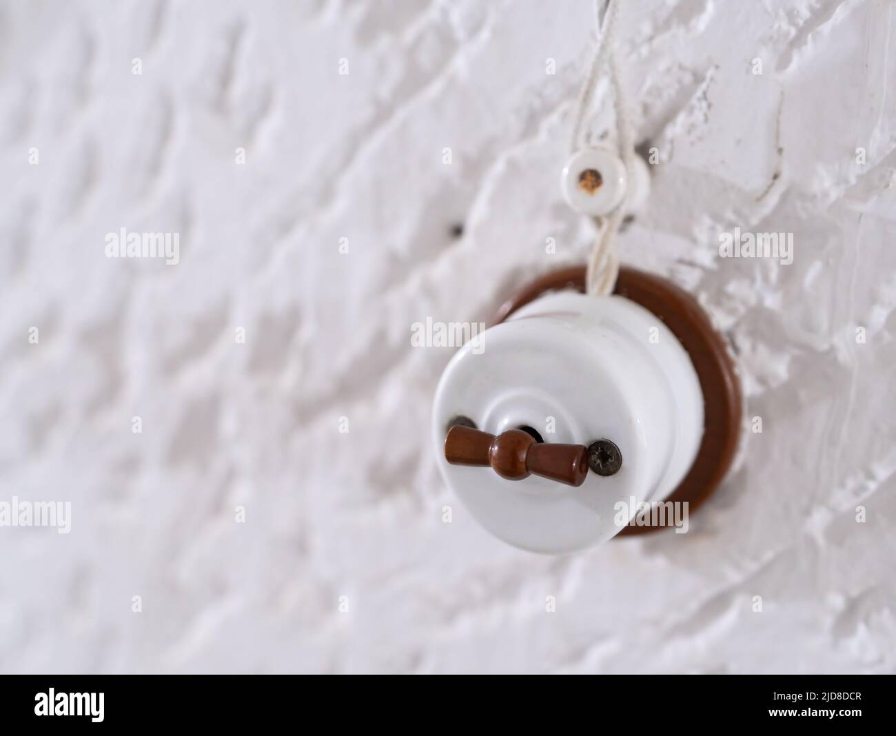 Alte antike Vintage Lichtschalter Nahaufnahme Stockfoto