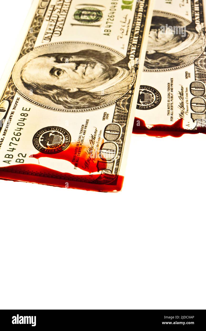 Dollar-Banknoten mit Blut befleckt Stockfoto