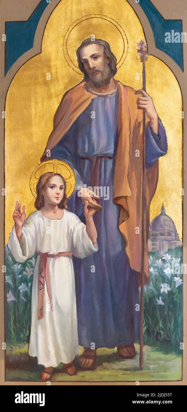 BARI, ITALIEN - 3. MÄRZ 2022: Das Gemälde des heiligen Josef mit der jungen Jesus-Kirche Chiesa dell Immacolata von Umberto Colonna aus dem Jahr 20. Stockfoto