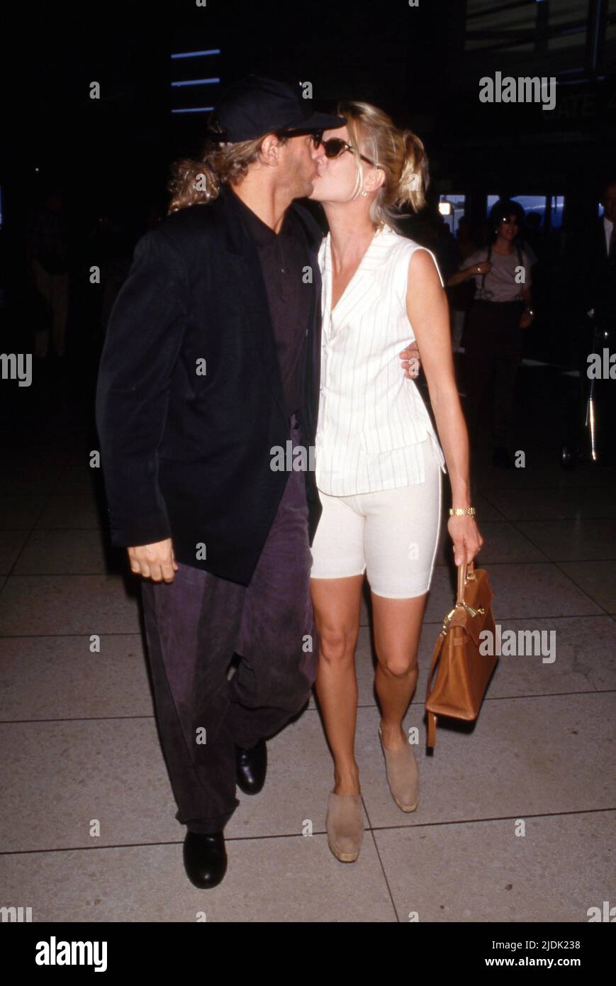 Nicollette Sheridan und Michael Bolton um die 1990er Jahre Credit