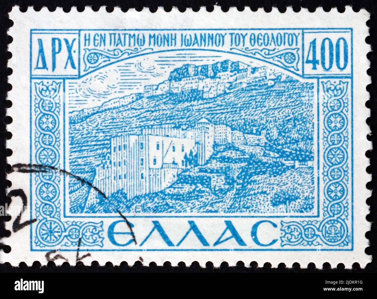 GRIECHENLAND - UM 1950: Eine in Griechenland gedruckte Briefmarke zeigt das Kloster, in dem der heilige Johannes predigte, Patmos, um 1950 Stockfoto