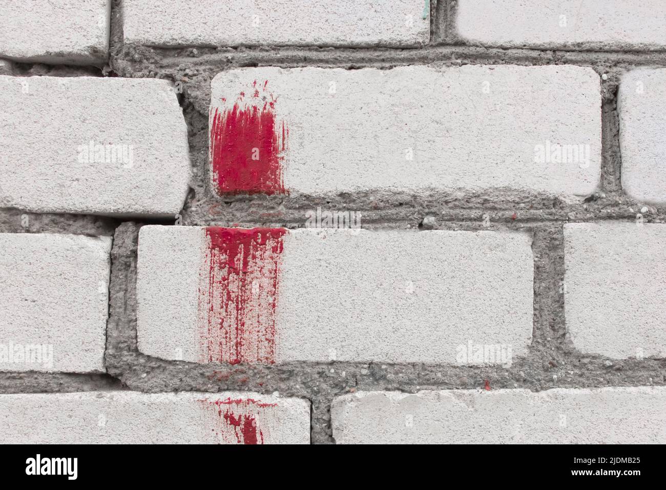 Rot Farbe Punkt Pinsel Fleck abstrakt Muster Kunst Stadt Wand Hintergrund Design. Stockfoto