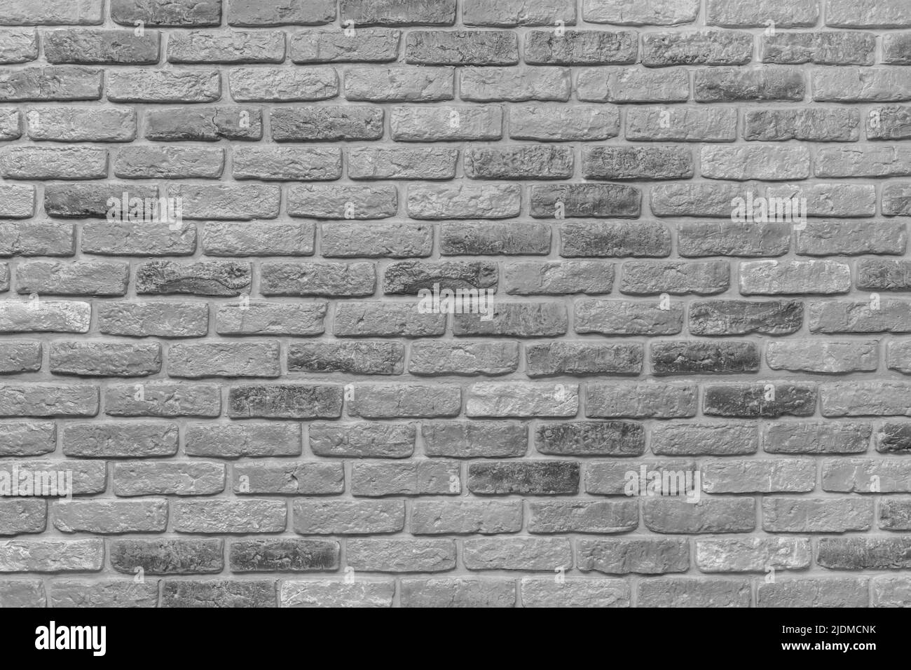 Grau Ziegelwand Textur alten Stein Hintergrund Mauerwerk grau rau. Stockfoto