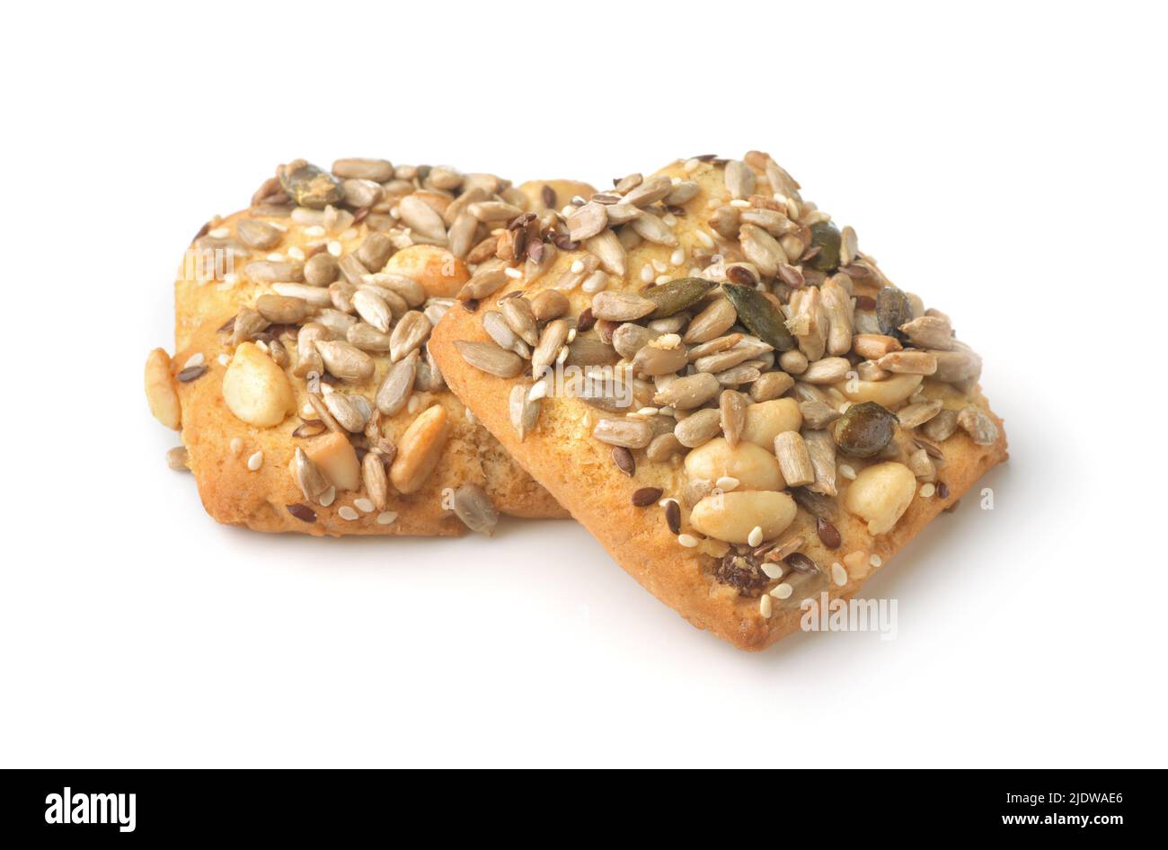 Kekse mit Nüssen und Samen isoliert auf weiß Stockfoto