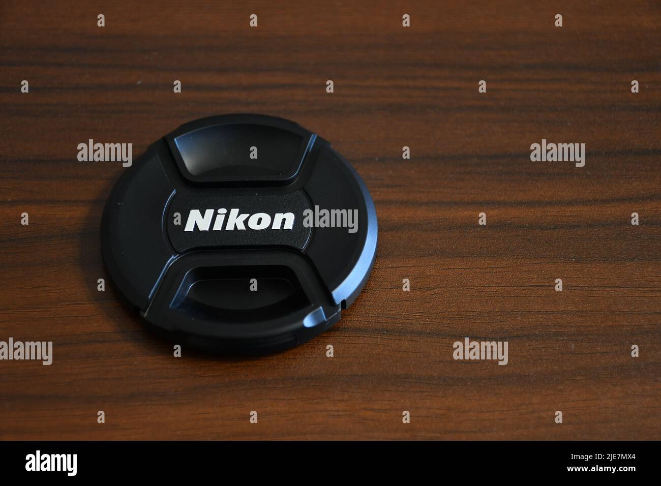 Objektivkappe eines Nikon Digital Objektivs Stockfoto