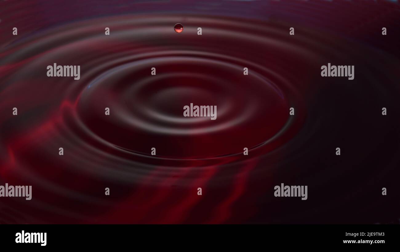 Wassertropfen-Fotografie: Rote Wassertropfen Stockfoto