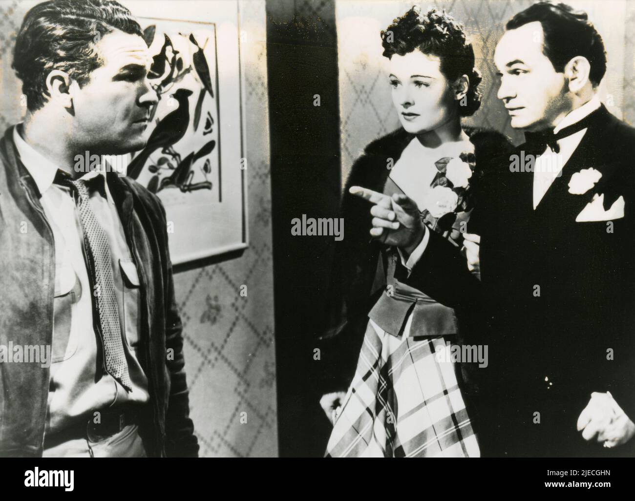 Der Schauspieler Gene Lockhart, die Schauspielerin Ruth Hussey und der Schauspieler Edward G. Robinson im Film Erpressung, USA 1939 Stockfoto