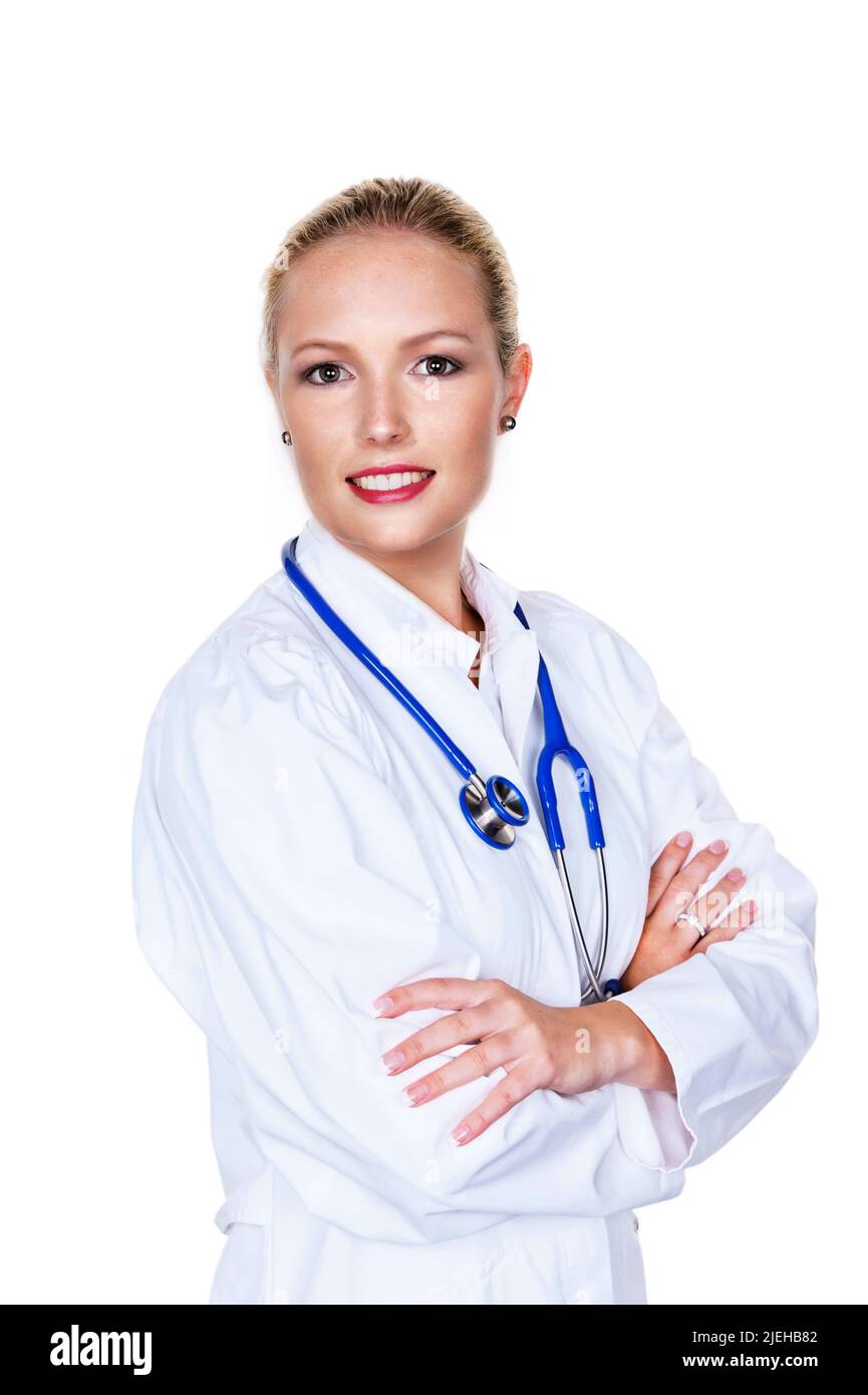 Eine junge blonde Ärztin mit Stethoskop in ihrer Arztpraxis.Frai, 30, 35, Jahre, Arztkittel, Sommersprossen, Stockfoto