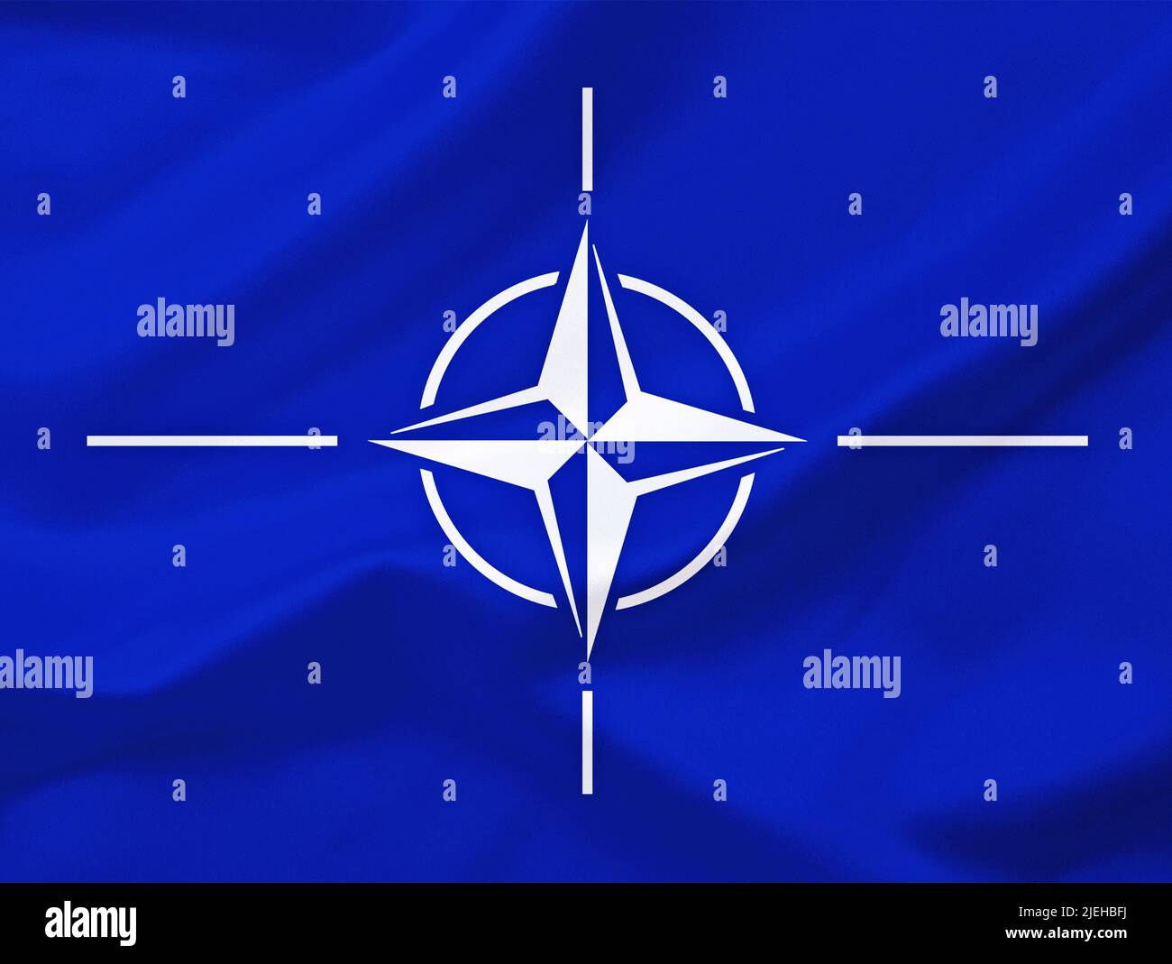Die Flagge der NATO, Schutzmacht bestehend aus 30 Mitgliedsstatten, Zusammenfluss souveräner Staaten, Nordatlantikpaket, Atlantisches Bündnis, Stockfoto