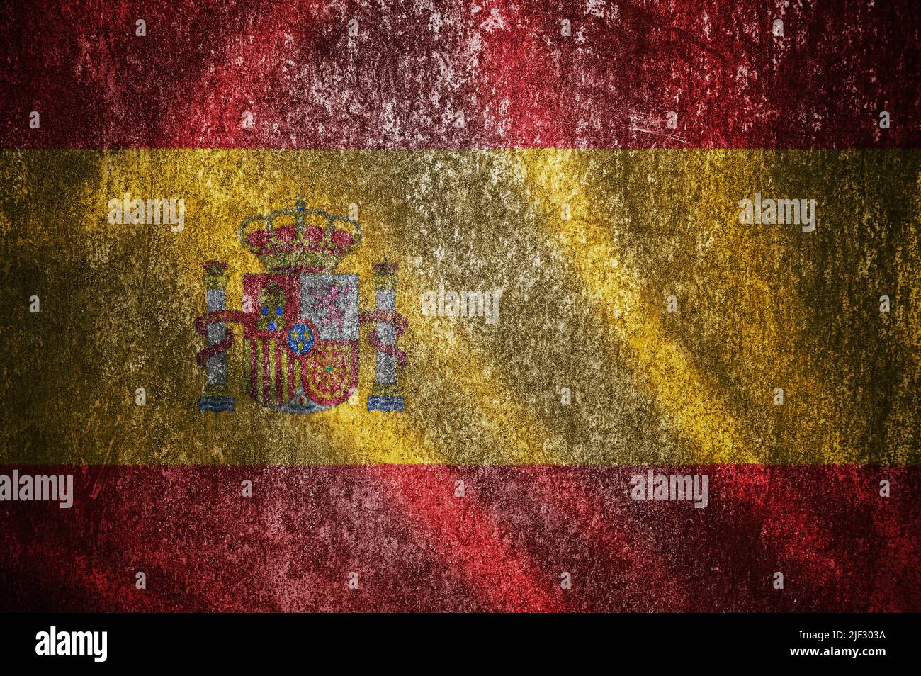 Nahaufnahme der grunge spanischen Flagge. Schmutzige Spanien-Flagge auf einer Metalloberfläche. Stockfoto