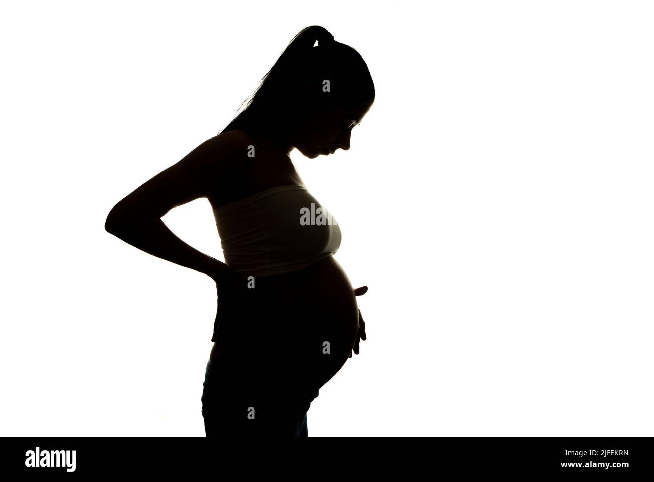 Silhouette der schwangeren Frau Stockfoto