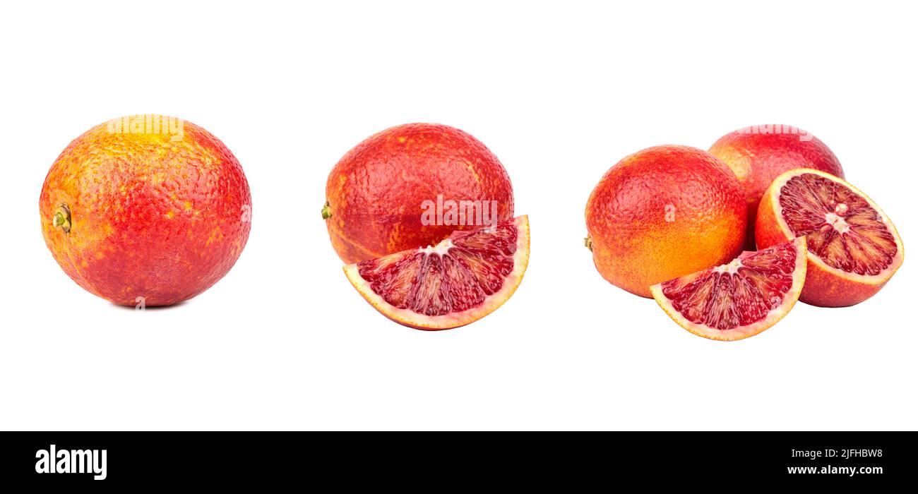 Set aus frischen ganzen, halb und in Scheiben geschnittenen roten Blutorangen-Früchten isoliert auf weißem Hintergrund Stockfoto