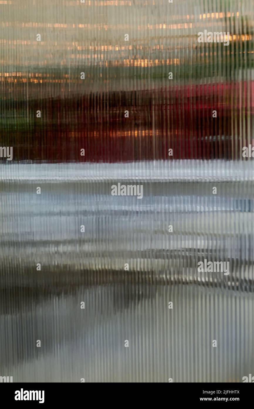 Abstrakter Hintergrund, der durch das Plexi-Fenster schaut Stockfoto