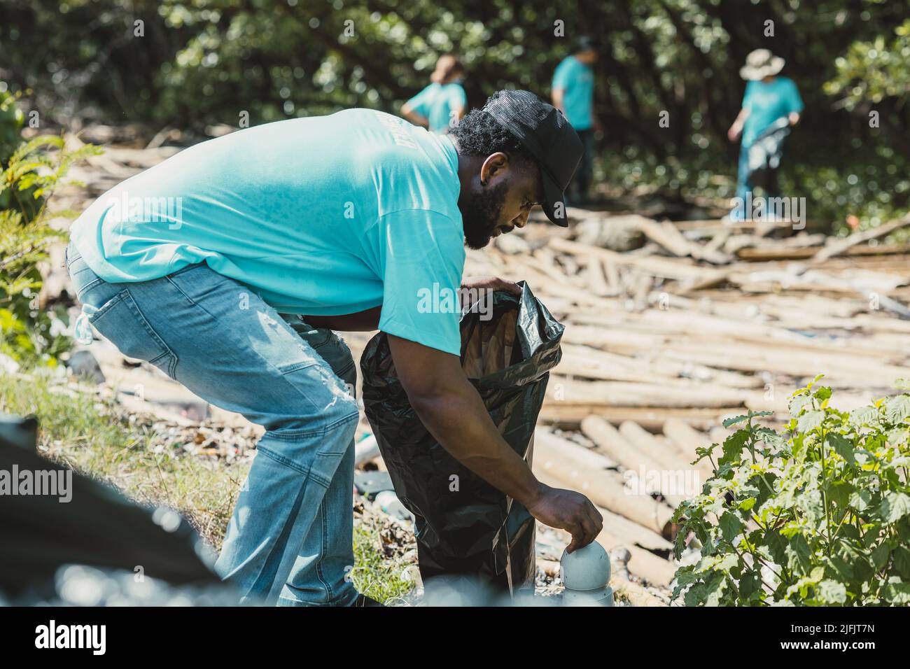 Volunteer People Cleanup Waste and Pollution for Save Environment in Earth Day. Stockfoto