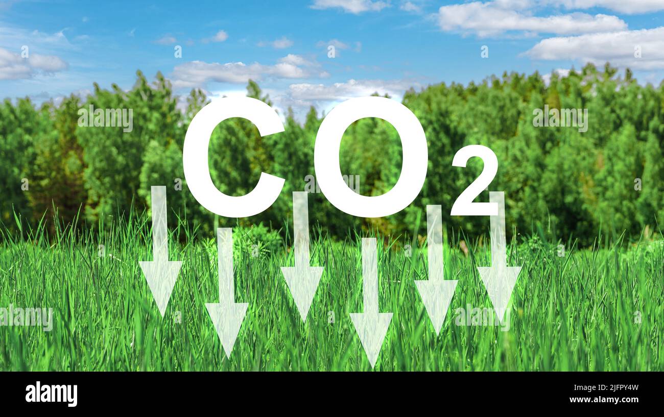 Emissionskonzept CO2 reduzieren. Grüne Unternehmen mit erneuerbaren Energien können den Klimawandel und die globale Erwärmung begrenzen. CO2 Emissionen senken und Carbo reduzieren Stockfoto