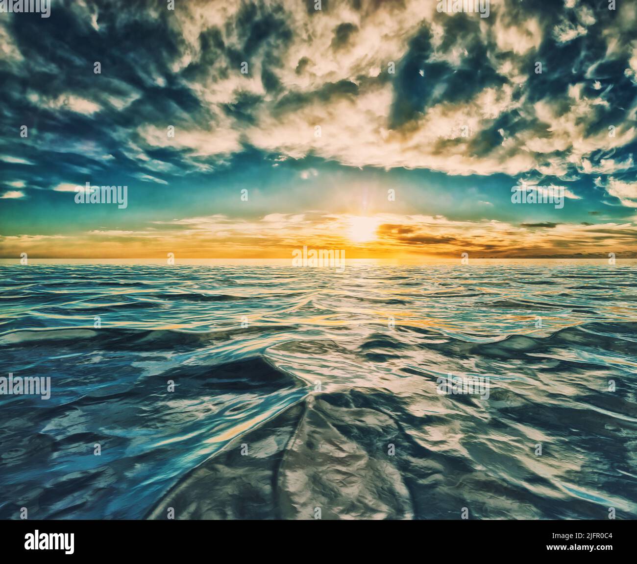 Sonnenaufgang oder -Untergang über kaltem, rauschendem Meer Stockfoto