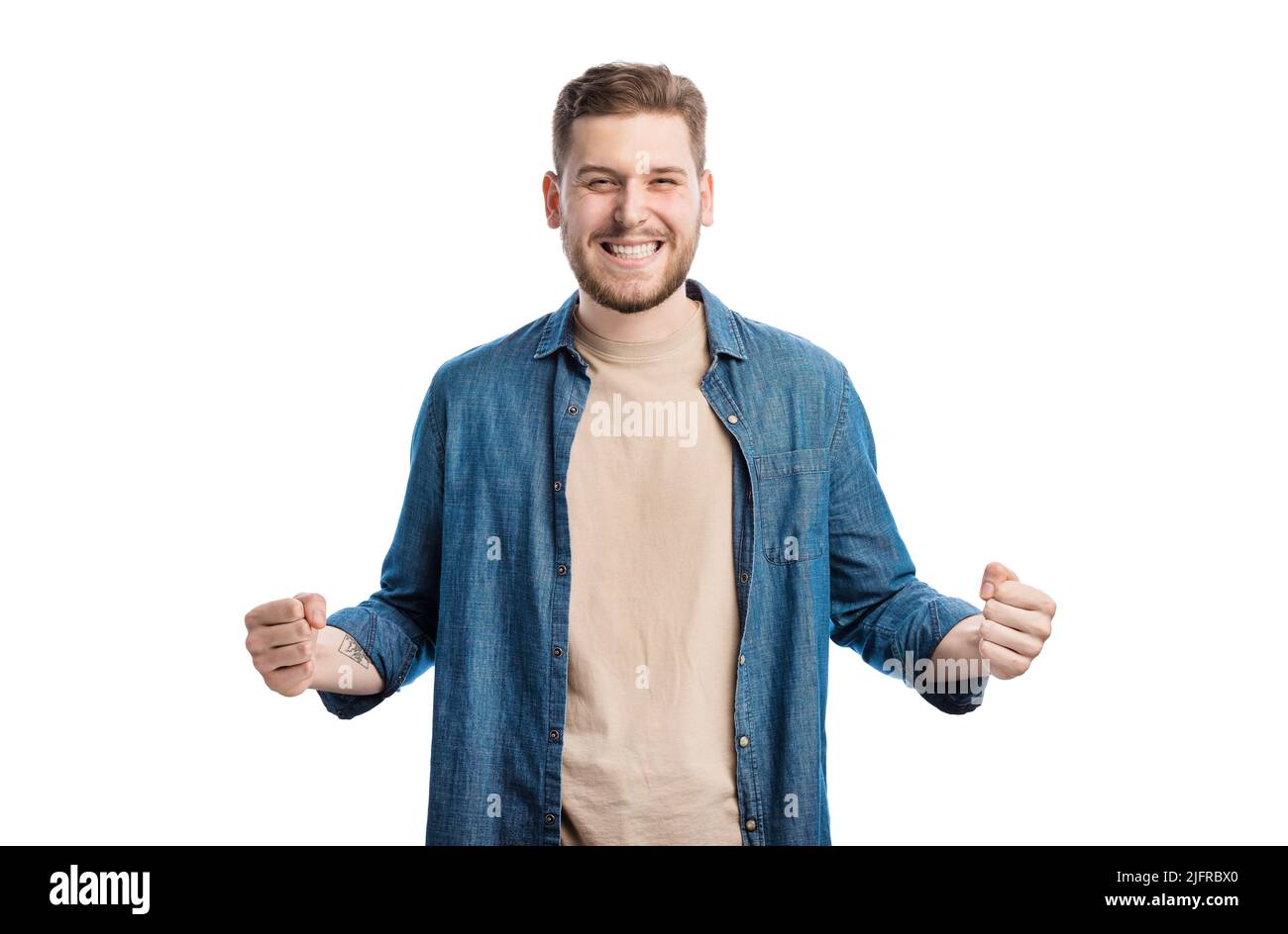 Mann, der in der Siegposition steht Stockfoto