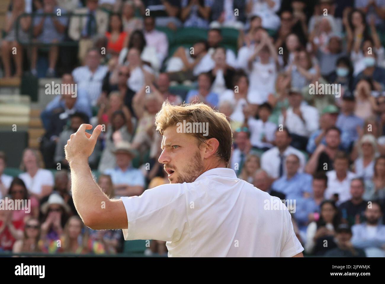 Wimbledon, Großbritannien, 05/07/2022, der Belgier David Goffin reagiert während eines Tennisspiels gegen Großbritannien Norrie im Finale 1/8 des Männer-Einzelturniers beim Wimbledon Grand Slam-Tennisturnier 2022 im All England Tennis Club, im Südwesten von London, Großbritannien, Dienstag, 05. Juli 2022. BELGA FOTO BENOIT DOPPAGNE Stockfoto