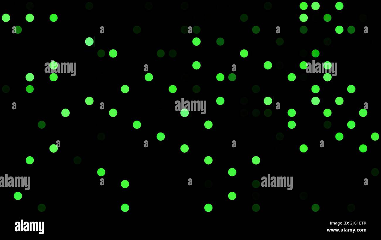 Schwarzer Hintergrund mit grün blinkenden Kreisen auf schwarzem Hintergrund. Bewegung. Verpixeltes Muster mit zufällig blinkenden kleinen Kreisen Stockfoto