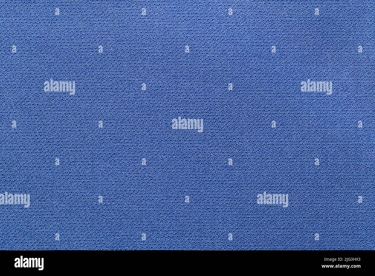 Die dunkelblaue Stoffstruktur als Hintergrund. Stockfoto