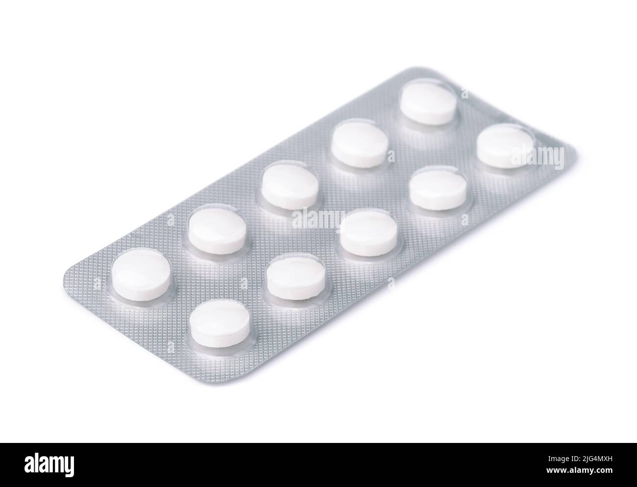 Weiße Pillen in Blisterpackung isoliert auf weiß Stockfoto