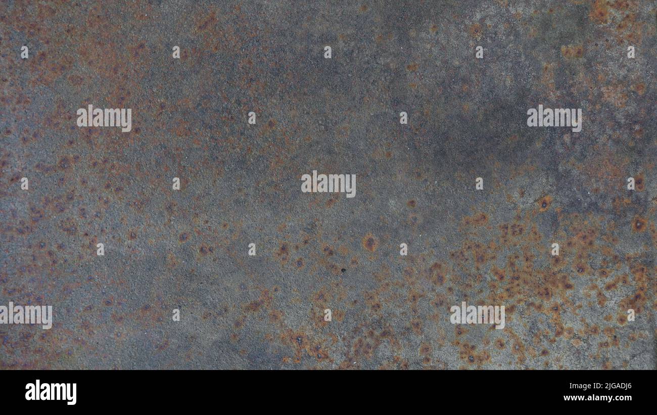 Dunkler Hintergrund mit hellen natürlichen Texturen und Kratzern. Nahaufnahme von Hintergründen mit Grunge-Struktur und Mustern Stockfoto