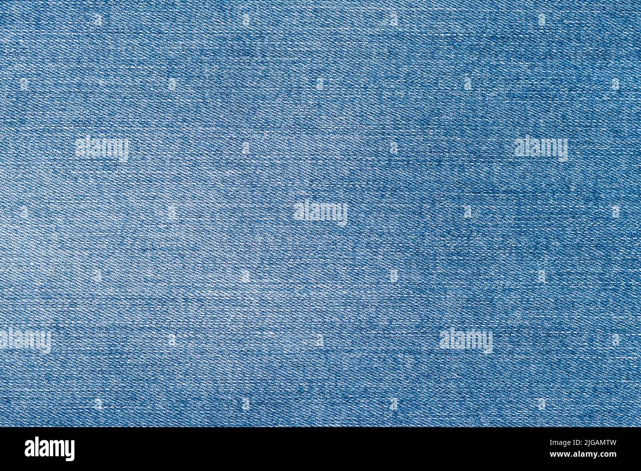 Textur Denim Hintergrund, Nahaufnahme Jeans, Details Linienmuster, Stoffoberfläche, blaue Stofftapete, Raues Material Stockfoto