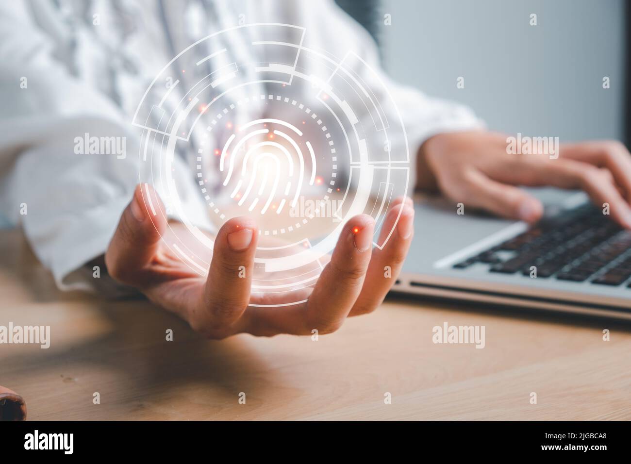 Geschäftsfrau Hand mit Fingerabdruck-Identifizierung für den Zugriff auf persönliche Finanzdaten, Fingerabdruck-Scan bietet Sicherheitszugriff mit Biometrie-iden Stockfoto