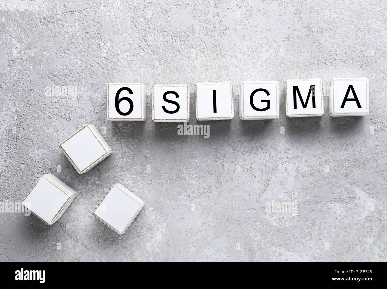 Würfel mit Text 6 SIGMA auf grunge Hintergrund Stockfoto