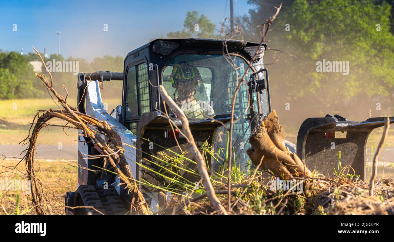 Maschinenbagger und Räumer Landarbeiter. Stockfoto
