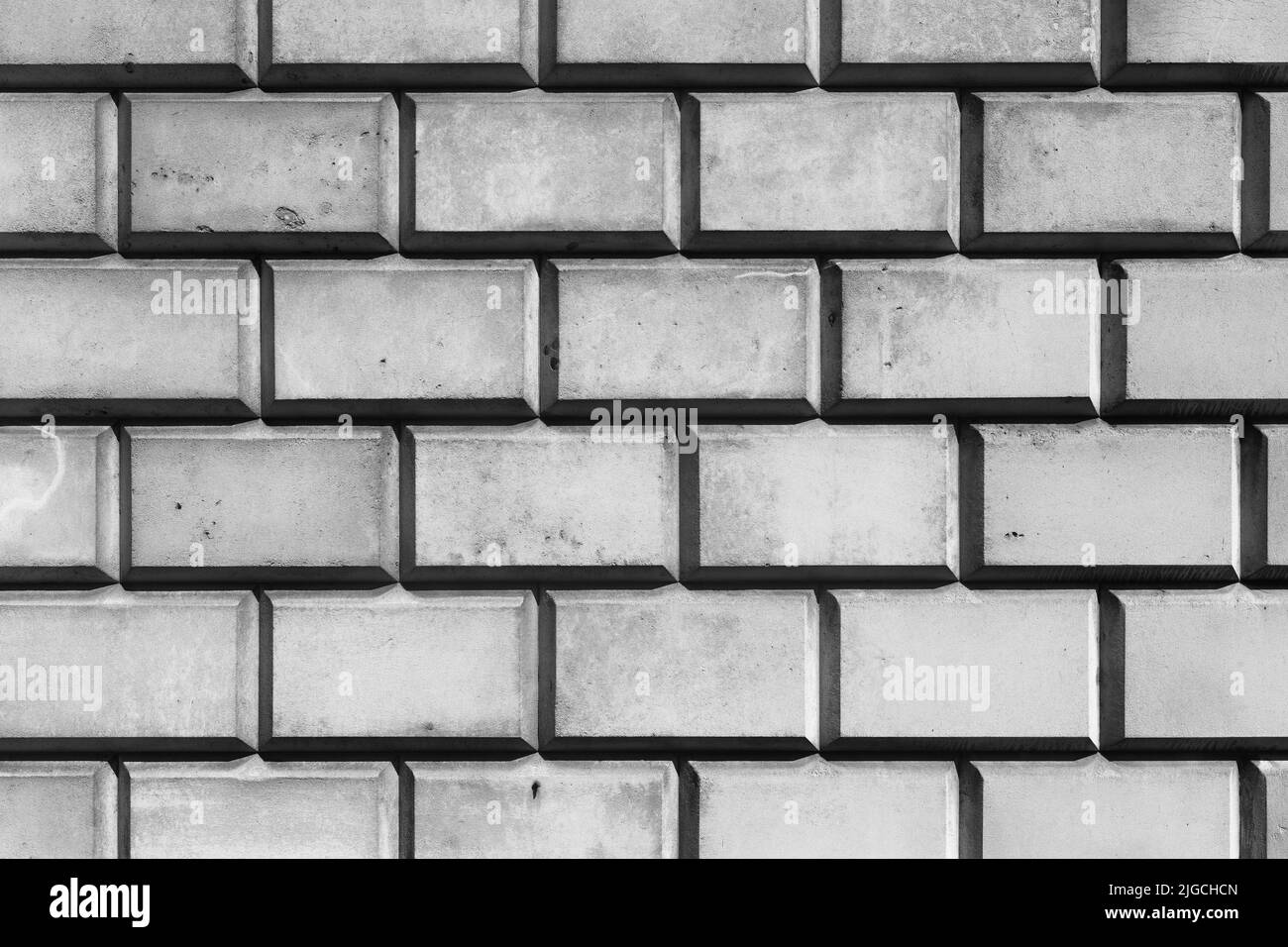 Zusammenfassung einer großen blockwand aus brock in Nahaufnahme Stockfoto