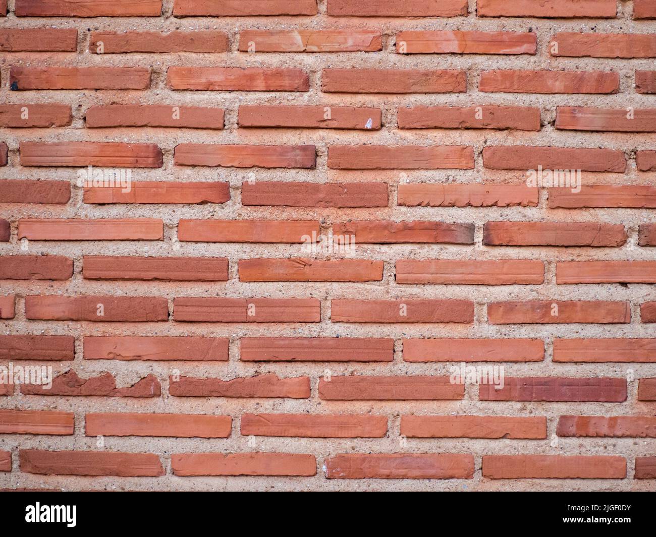 Alte grunge Backsteinmauer Hintergrund rote Farbe Stockfoto