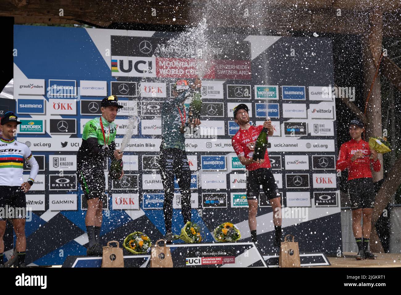 Braindot Luca, Fluckiger Mathias, Hatherly Alan während des Mercedes-Benz UCI Mountain Bike World Cup, Downhill Final man Elite Race Round in Lenzerheide, Stockfoto