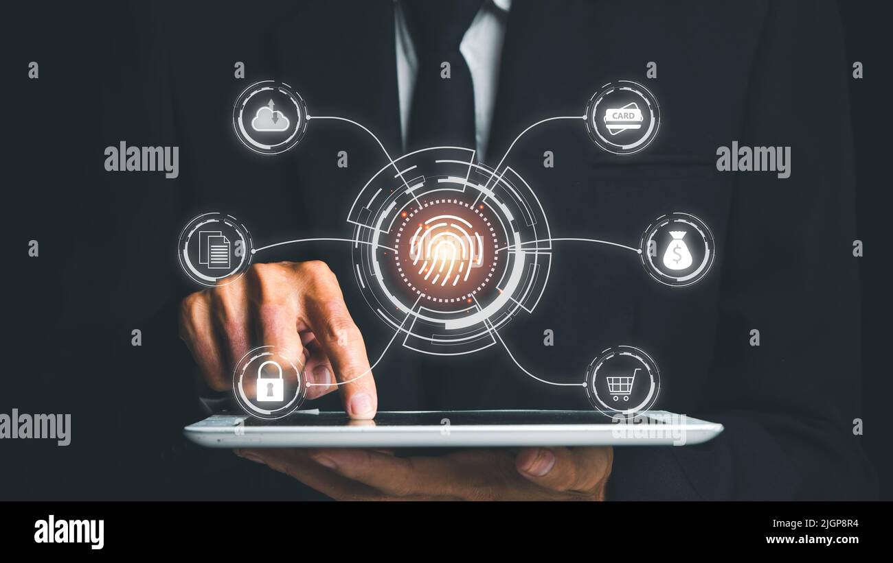 Businessman Hand mit Fingerabdruck-Identifizierung für den Zugriff auf persönliche Finanzdaten, Fingerabdruck-Scan bietet Sicherheitszugriff mit biometrischen Identifizierungen Stockfoto