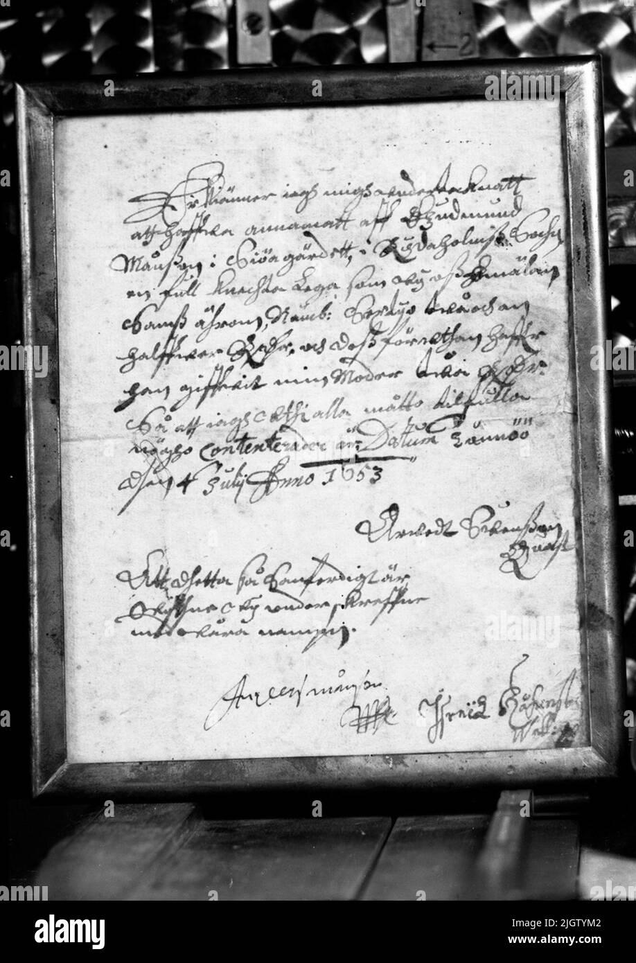 Handschriftlich fotografiert, gerahmt und glasiert. Der Inhalt ist unbekannt. Stockfoto