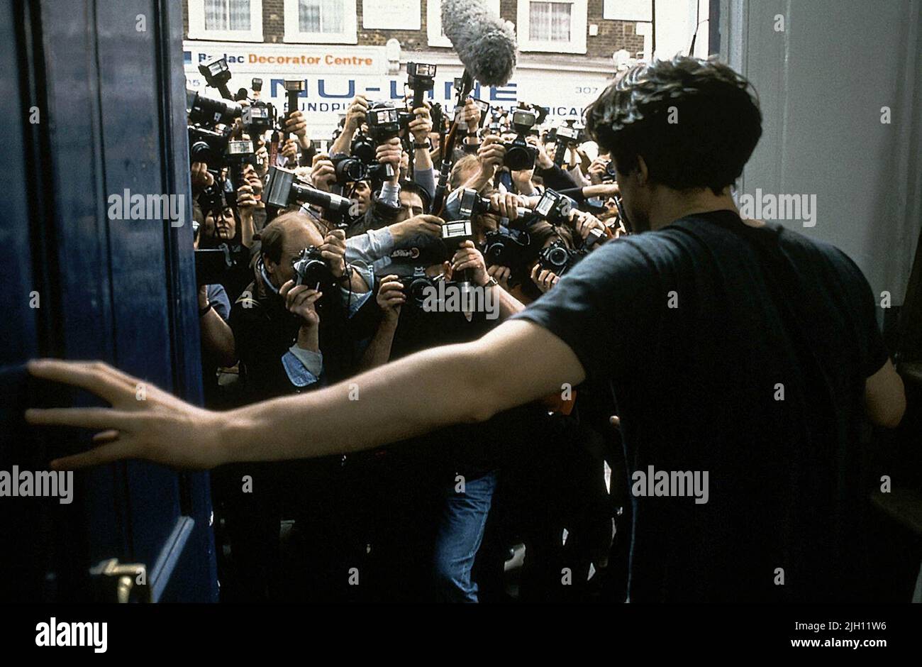 GRANT, PAPARAZZI, NOTTING HILL, 1999 Stockfoto