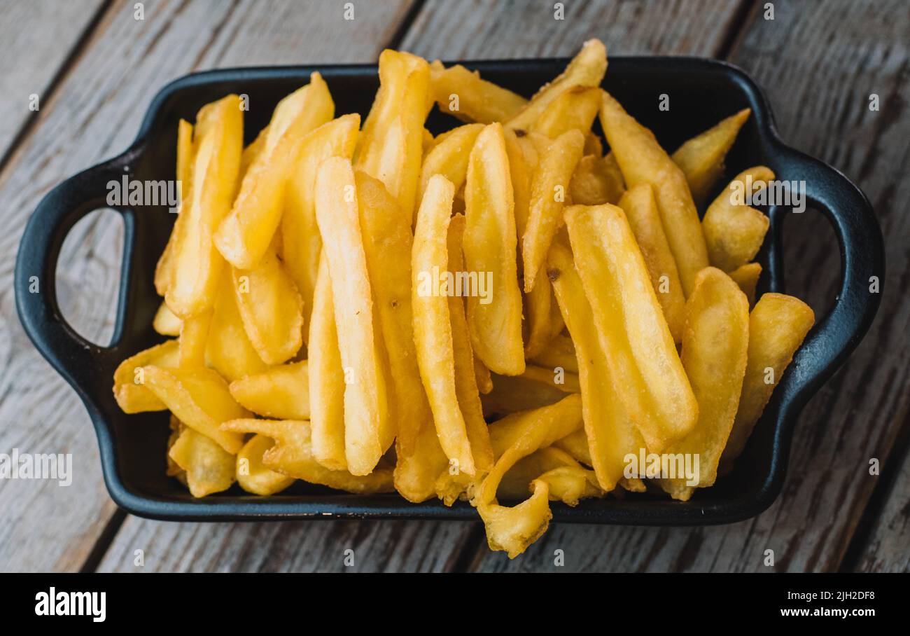 Deluxe serviert Pommes in einem Restaurant Stockfoto