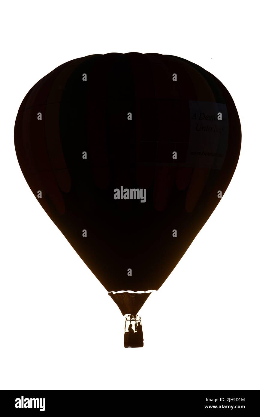 Silhouette eines Heißluftballons auf weißem Hintergrund. Stockfoto