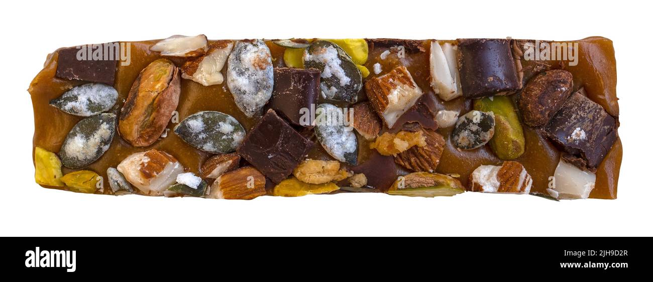 Isolierte Leckere Snack-Bar Auf Flapjack-Basis Mit Schokolade, Karamell, Samen Und Nüssen Stockfoto