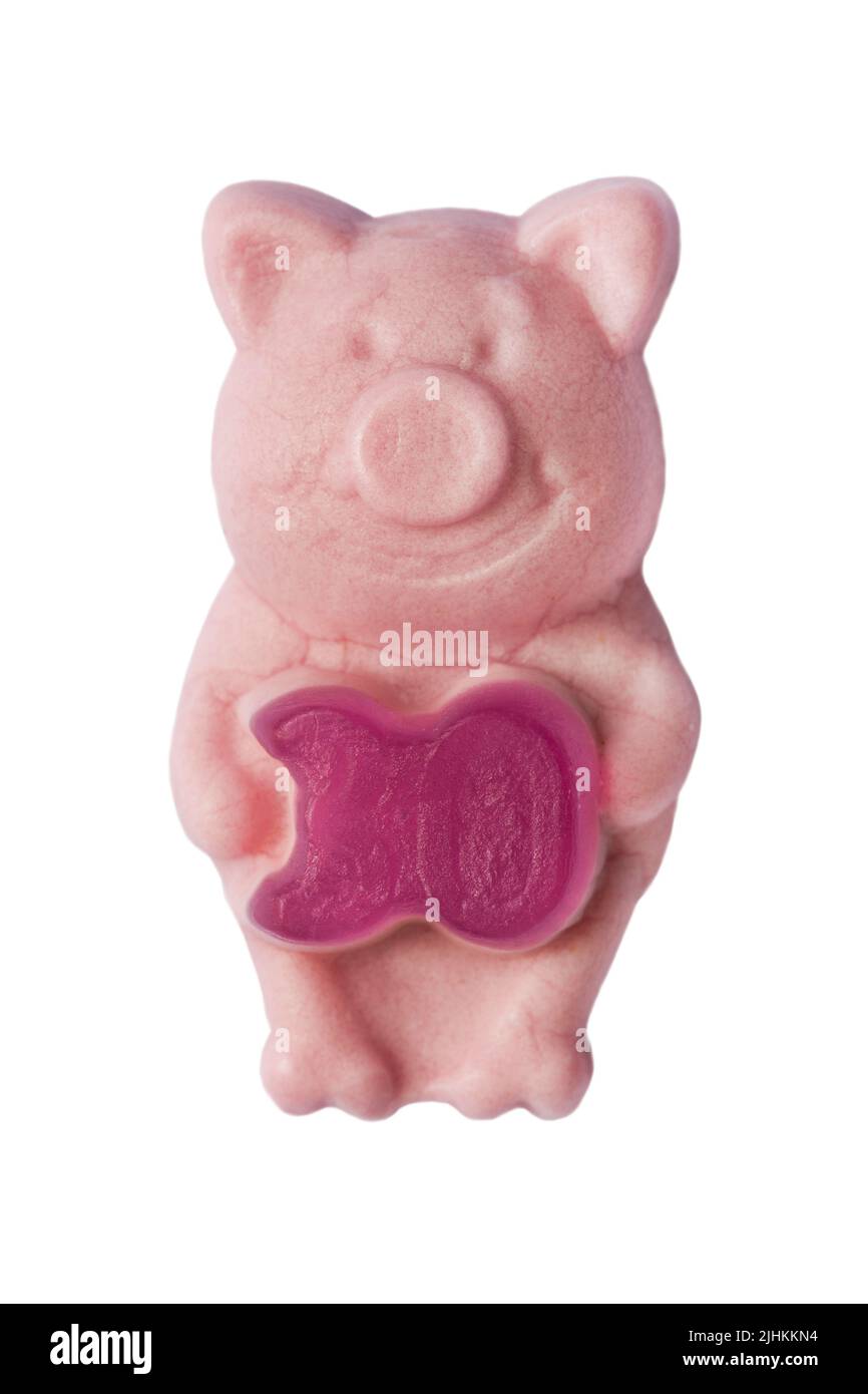 M&S Percy Pig Sweet feiert 30 Jahre mit echtem Fruchtsaft isoliert auf weißem Hintergrund - limitierte Auflage Stockfoto