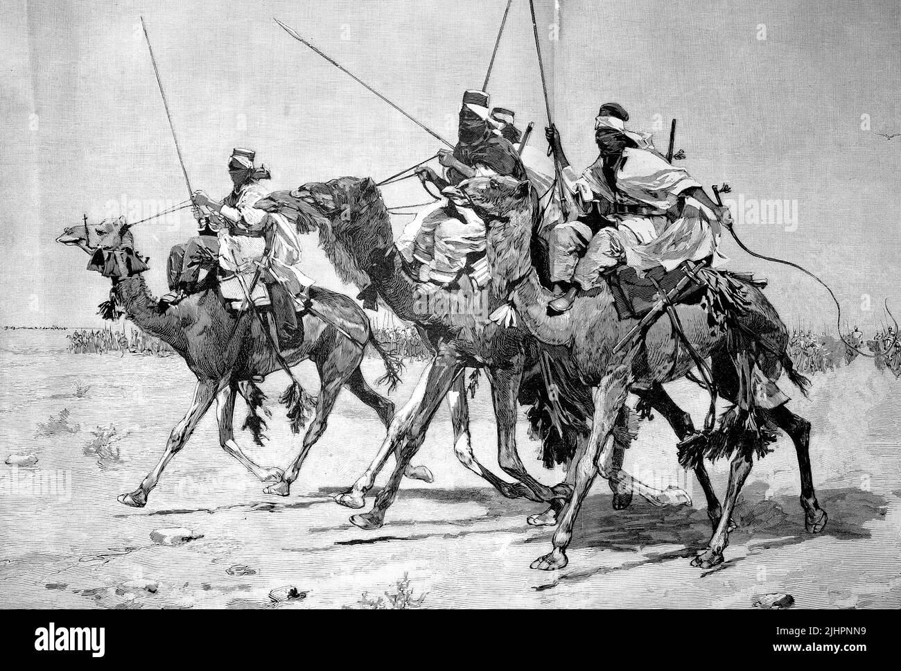 Ein Kamelritt der Tuareg in Libyen, Vorhut, der führende Teil einer vorrückenden Militärformation / A camel ride of the Tuareg people in Libya, avantgardist, Advance Guard, the leading part of an Advancing Military Formation, Historisch, digital restaurierte Produktion einer Originalvorlage aus dem 19. Jahrhundert, das Originaldatum nicht bekannt, Stockfoto