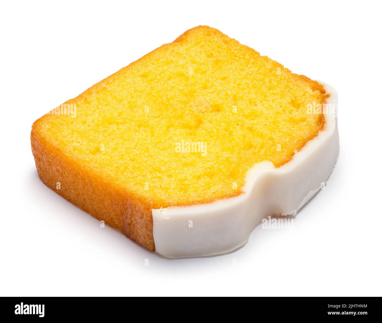 Scheibe Milchzitronenkuchen auf Weiß geschnitten. Stockfoto